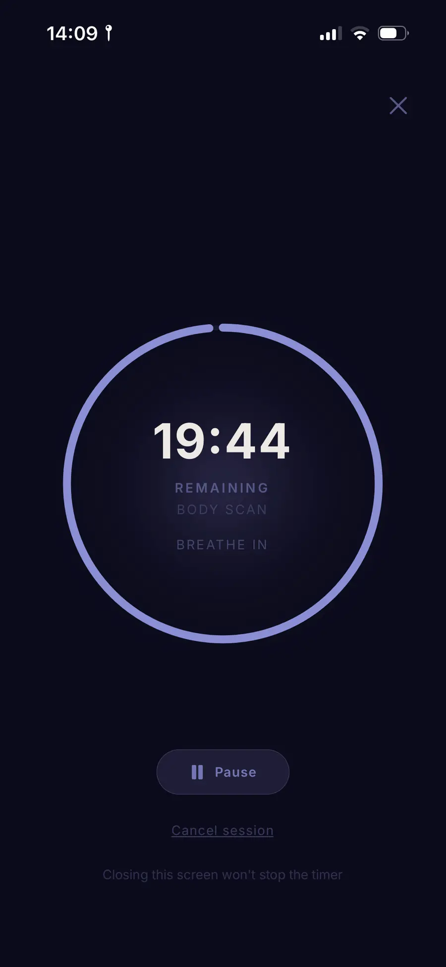 A Fenix meditation screen with a countdown ring and a breathing cue